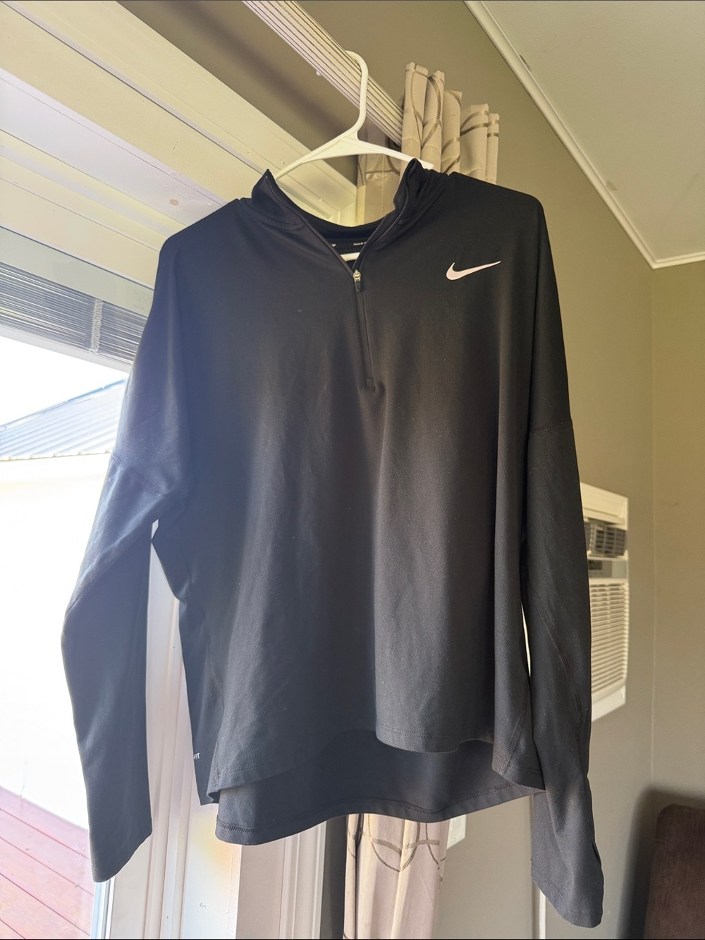 Nike Black Long-Sleeve Half-Zip Pullover with White Swoosh
